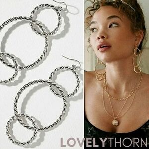 VANESSA MOONEY // ltd ed silver interlocked dangle rope style hoop earrings